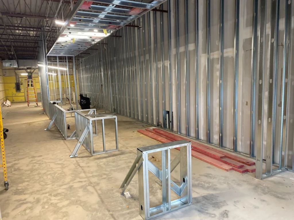 A spacious room with metal framing