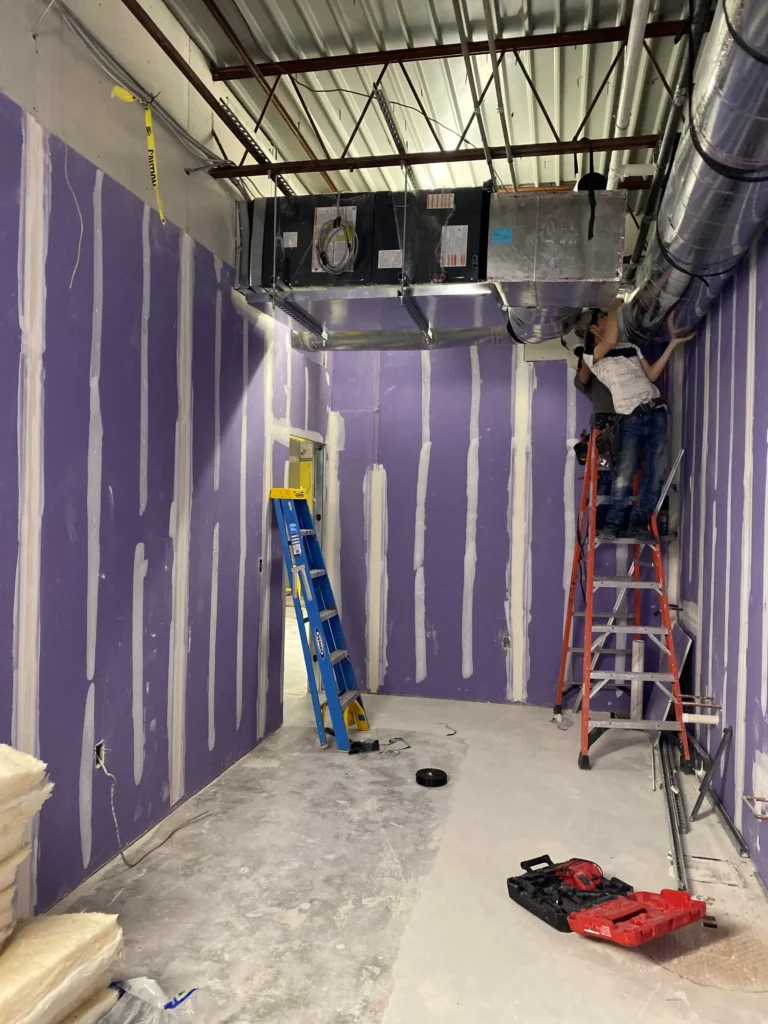 A room adorned with purple walls