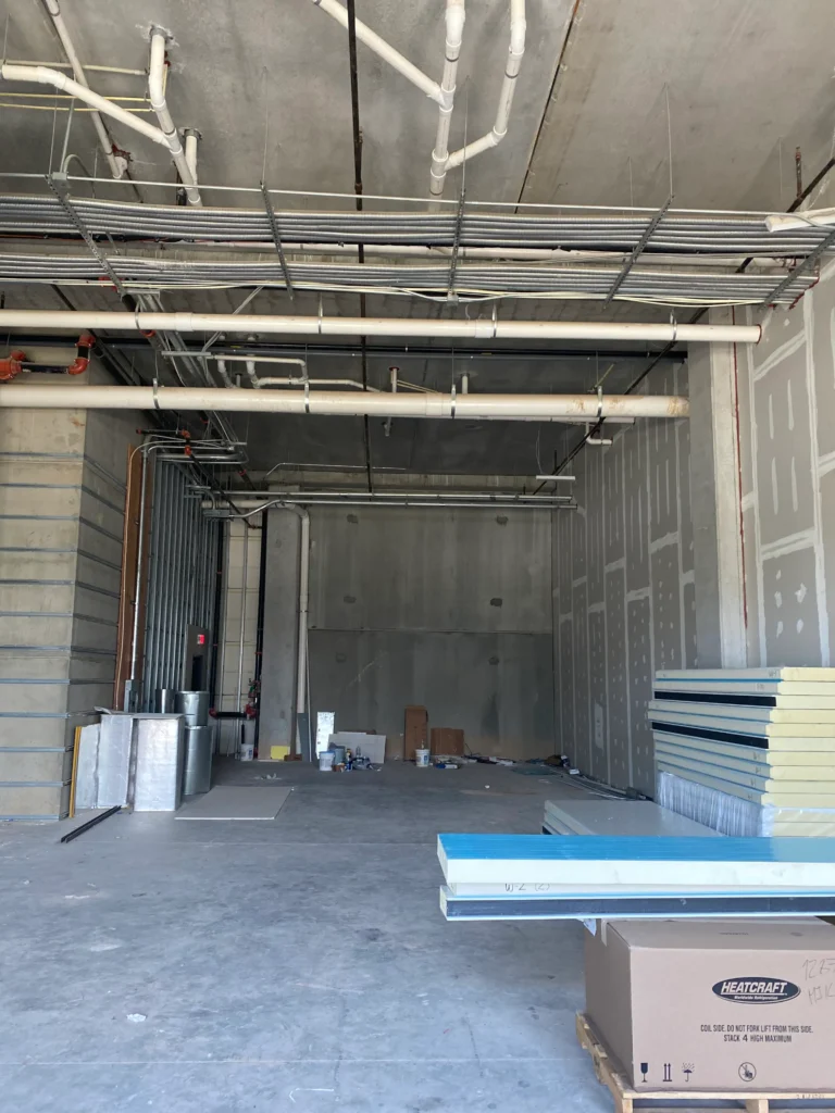 An expansive room showcasing numerous pipes