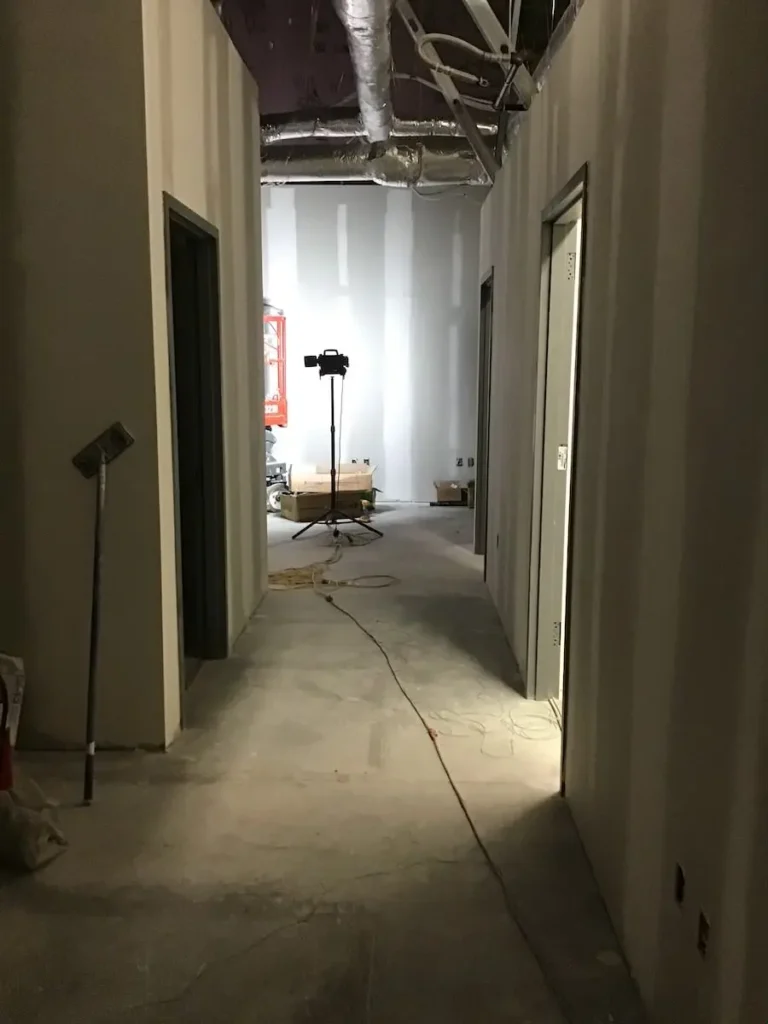 A hallway with a central light source
