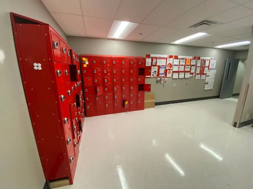 A corridor lined with red lockers