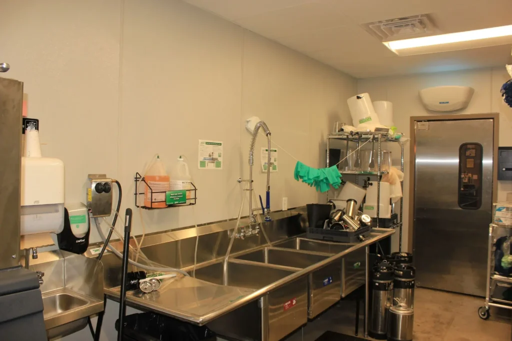 A kitchen featuring a sink, a refrigerator