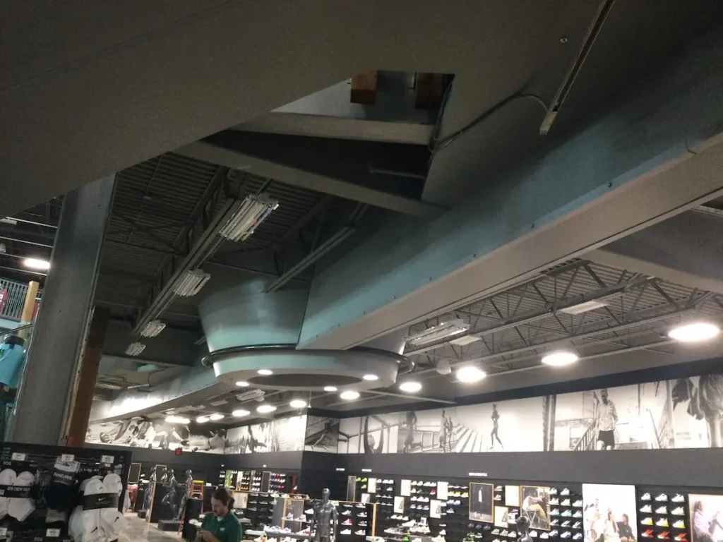 A store interior featuring a ceiling entirely covered in black