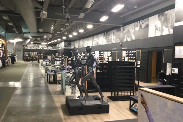 Interior view of a sporting goods retail store showcasing a completed retail construction project by Modern Day Commodities