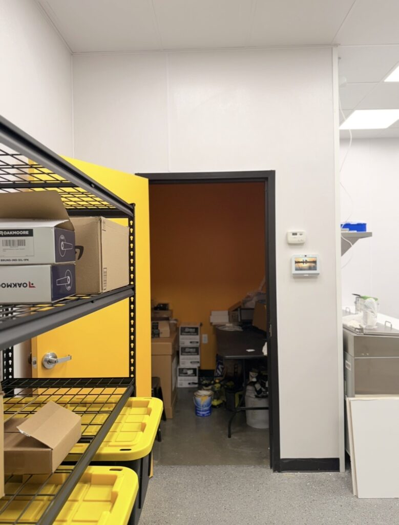 Back-of-house storage and service area for commercial taproom operation