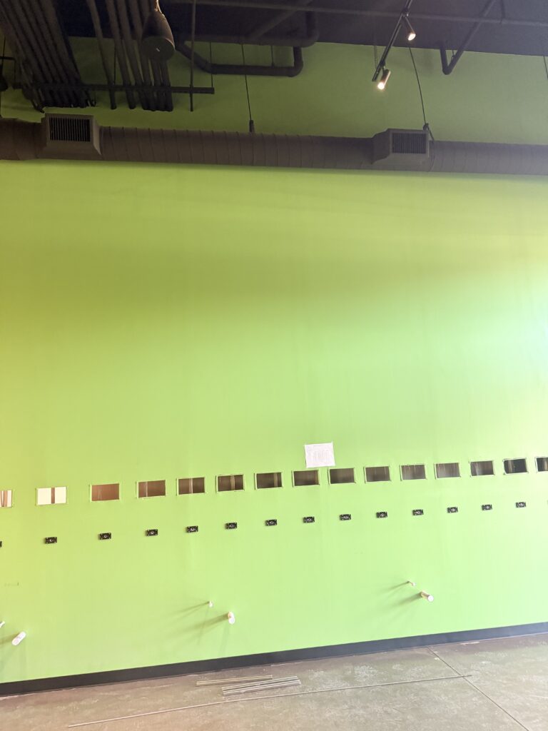 Interior wall painting and finish preparation in commercial taproom build-out
