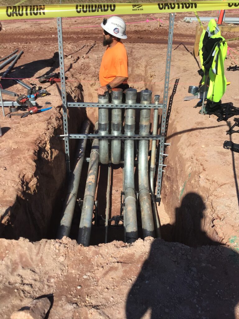 Lidl supermarket underground utility installation and conduit routing during ground-up construction in Decatur GA