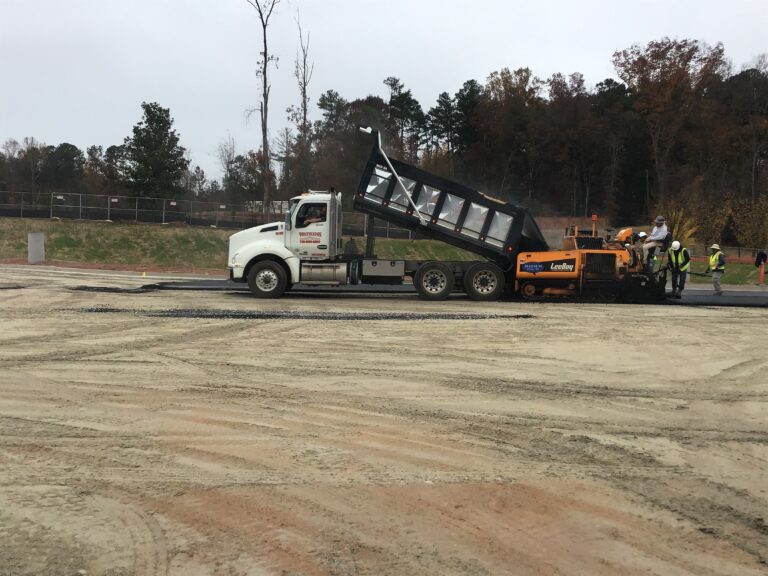 Lidl supermarket asphalt paving operations during parking lot construction in Decatur GA