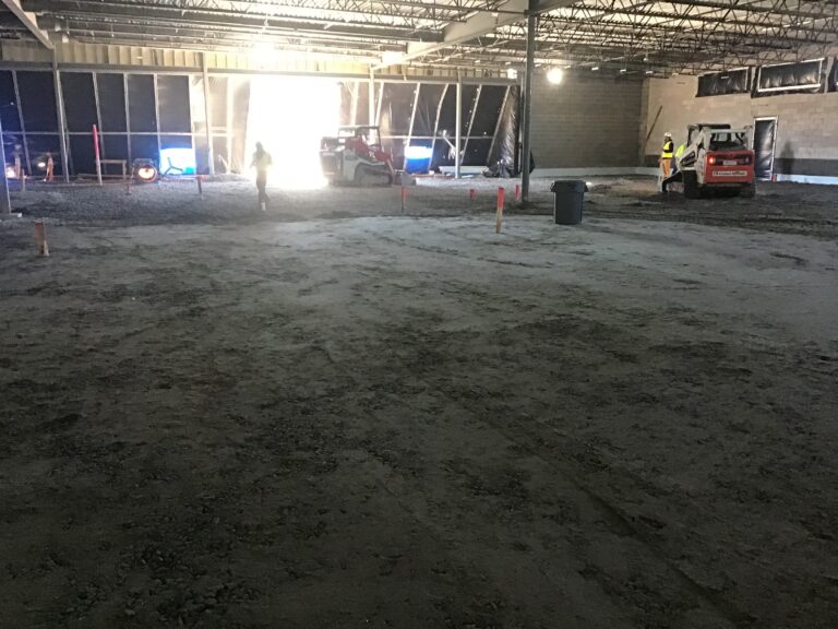 Lidl supermarket interior slab grading and stone base preparation during ground-up construction in Decatur GA