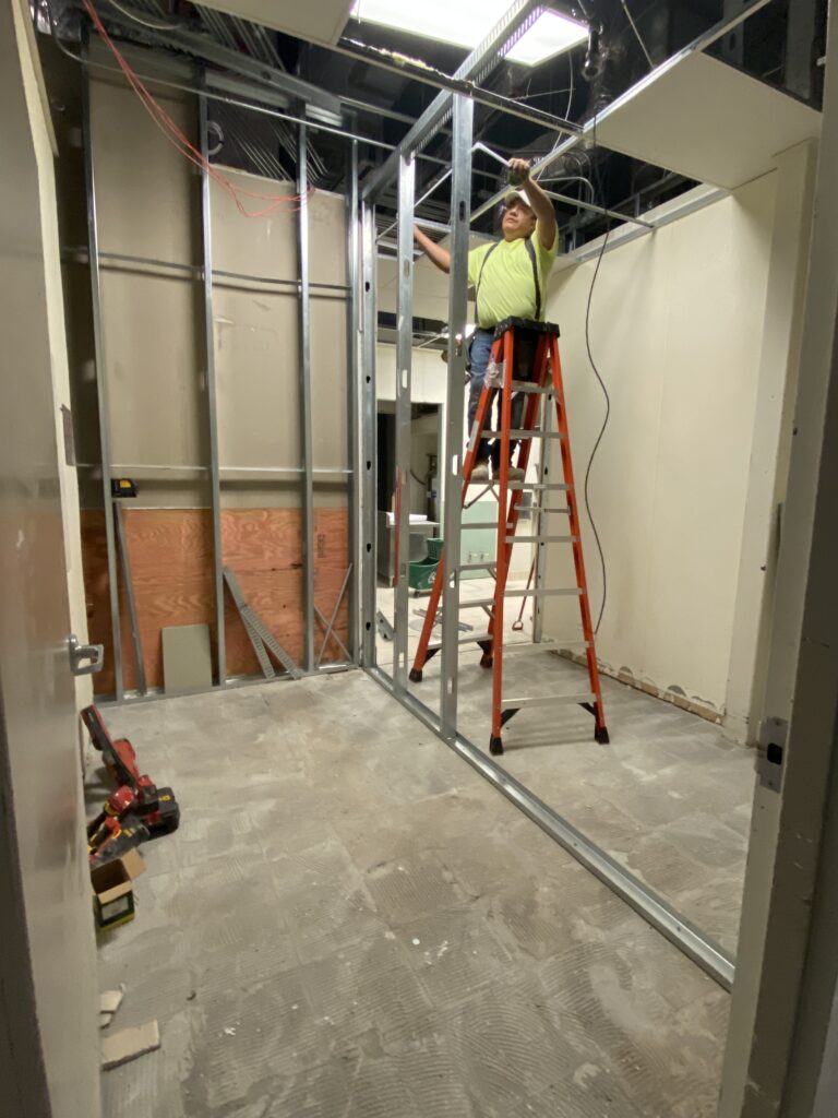 Commercial metal stud framing installation during Target store interior remodel project
