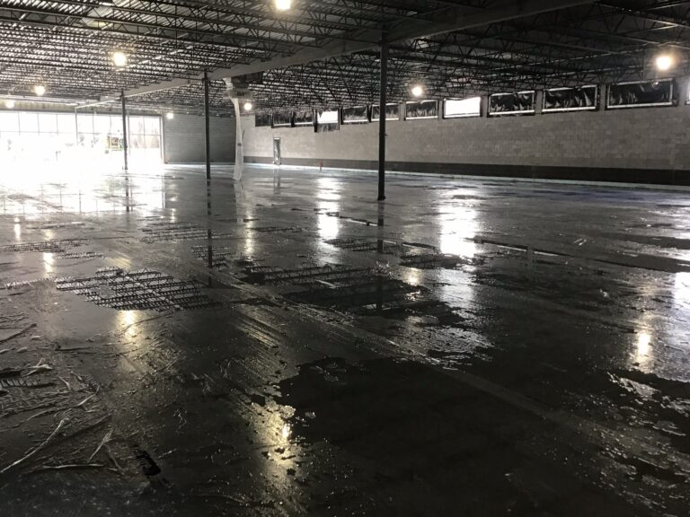 Lidl supermarket concrete slab finishing and interior floor installation during ground-up construction in Decatur GA